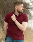 LCY LONDON | Embroidered Pocket Circle Logo Polo Shirt LCY London